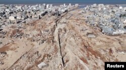 Pemandangan kawasan rusak pasca banjir di Derna, Libya, 13 September 2023, dalam tangkapan layar yang diperoleh dari video media sosial. (Foto: Marwan Alfaituri/via REUTERS)