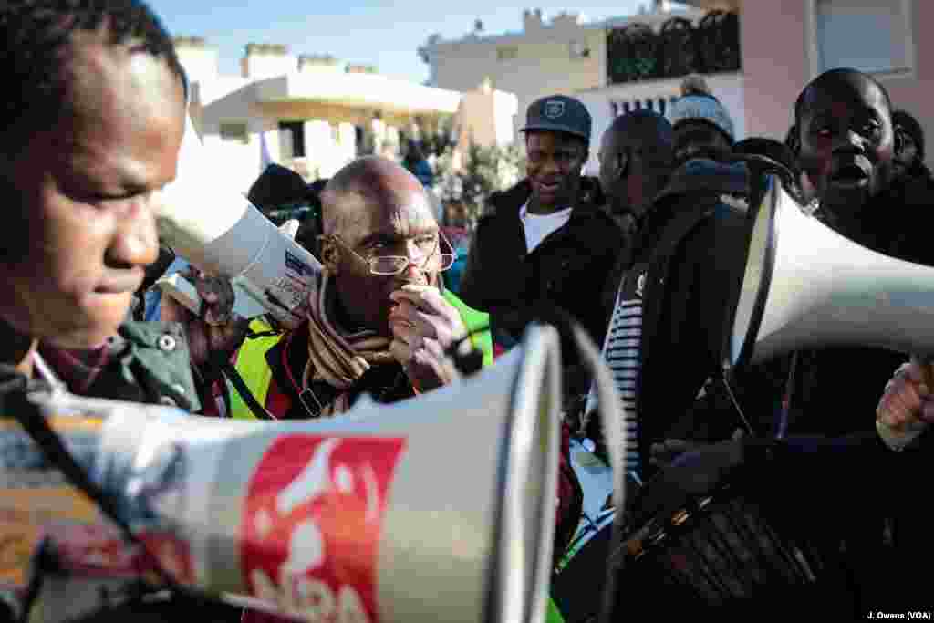 A protest in support of the rights of migrants and refugees is held outside the Menton Garavan train station — the first stop in France for those attempting to cross by train from Ventimiglia, Italy.