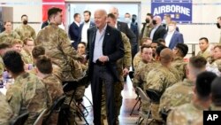 President Joe Biden visits with members of the 82nd Airborne Division March 25, 2022, in Jasionka, Poland.