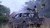 Foto yang diambil dari video AFP menunjukkan seorang anggota Boko Haram dalam sebuah pertempuran di Nigeria (foto: dok). 