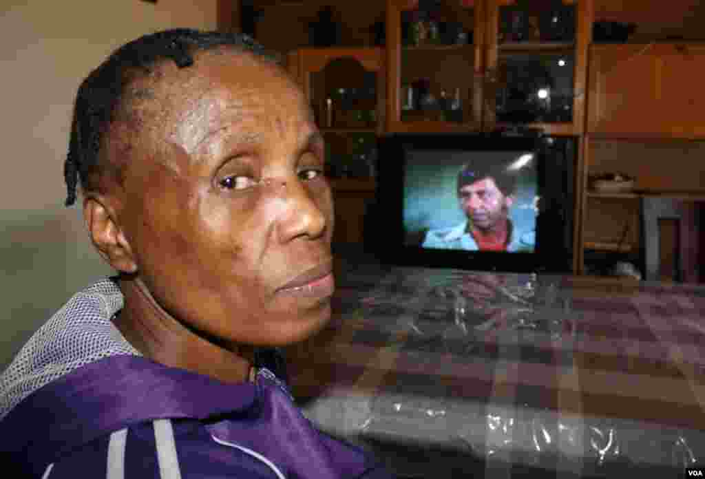 Evelyn Itumeleng is confined to a wheelchair in her Kagiso home west of Johannesburg. She is one of hundreds of thousands of South Africans suffering from infectious and non-commuicable diseases. (Photo by Darren Taylor)