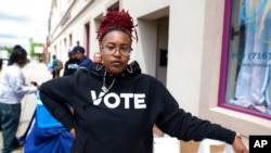 Jillian Hanesworth, with Open Buffalo, poses for a photo May 17, 2022, in Buffalo, NY. 'We see how Black and brown people get treated by the police,' she said, that police don't hesitate to 'take deadly action against Black and brown people.'