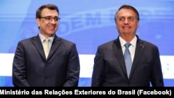 Carlos Alberto Franco França, ministro das Relações Exteriores (esq) e Jair Bolsonaro, Presidente do Brasil (dir), 19 Novembro 2021