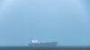 A megaship prepares to enter the Suez Canal from the Gulf of Suez at the northern end of the Red Sea. The waterway has been operating around the clock. (Hamada Elrasam/VOA)