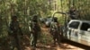 FILE - Soldiers keep watch at an area where the military eradicated a coca leaf plantation and dismantled a lab to process the drug in Guerrero state, Mexico, Feb. 22, 2021. Guerrero is one of Mexico's most violent regions and where three journalists disappeared in late 2022. 