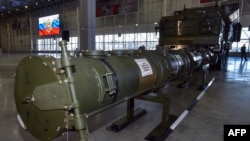 FILE - Russian Defence Ministry officials show off the Russia's 9M729 cruise missile at the military Patriot Park outside Moscow on Jan. 23, 2019.
