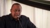 Former Kenya's President Uhuru Kenyatta speaks during the East African Community-led Nairobi Process, the third peace talk on the eastern region of Democratic Republic of Congo, in Nairobi on Nov. 30, 2022.