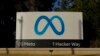 Meta's logo can be seen on a sign at the company's headquarters in Menlo Park, Calif., Nov. 9, 2022. Meta, which is Facebook's parent company, announced it is laying off 11,000 people, about 13% of its workforce.
