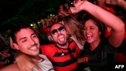 FILE - Fans of Flamengo react after winning the All-Brazilian 2022 Copa Libertadores final football match between Flamengo and Athletico Paranaense at the Botafogo neighborhood in Rio de Janeiro, Brazil, Oct. 29, 2022.