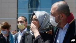 Hatice Cengiz, the fiancee of slain Saudi journalist Jamal Kashoggi, leaves a court in Istanbul, Friday, July 3, 2020, where the trial in absentia of two former aides of Saudi Crown Prince Mohammed bin Salman and 18 other Saudi nationals over the…
