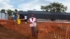 Members of Doctors Without Borders set up an Ebola treatment isolation unit at the Mubende regional referral hospital in Uganda on Sept. 24, 2022. 