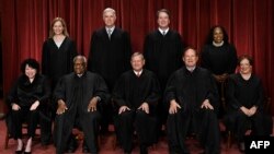FILE - The current U.S. Supreme Court sits for its official photo in Washington, Oct. 7, 2022. 