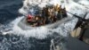 Nigerian special forces train with U.S. sailors aboard the NNS Burutu on February 13, 2010 to improve security for oil tankers in the Gulf of Guinea where the number of pirated oil tankers in on the increase.