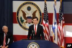 White House senior adviser Jared Kushner, right, speaks as U.S. Ambassador to Israel David Friedman listens during the opening ceremony of the new US embassy in in Jerusalem, May 14, 2018.