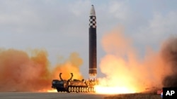 FILE - The North Korean government shows the test-firing of a missile at Pyongyang International Airport in Pyongyang, North Korea, Nov. 18, 2022. (Korean Central News Agency/Korea News Service via AP)