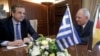 German Finance Minister Wolfgang Schaeuble (R) meets Greek Prime Minister Antonis Samaras in Athens, July 18, 2013. 