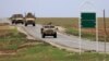 FILE - U.S. troops patrol near the Turkish border in Hasakah province, Syria, Nov. 4, 2018. 
