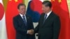 中國國家主席習近平在北京人大會堂會見到訪的南韓總統文在寅。（2019年12月23日）