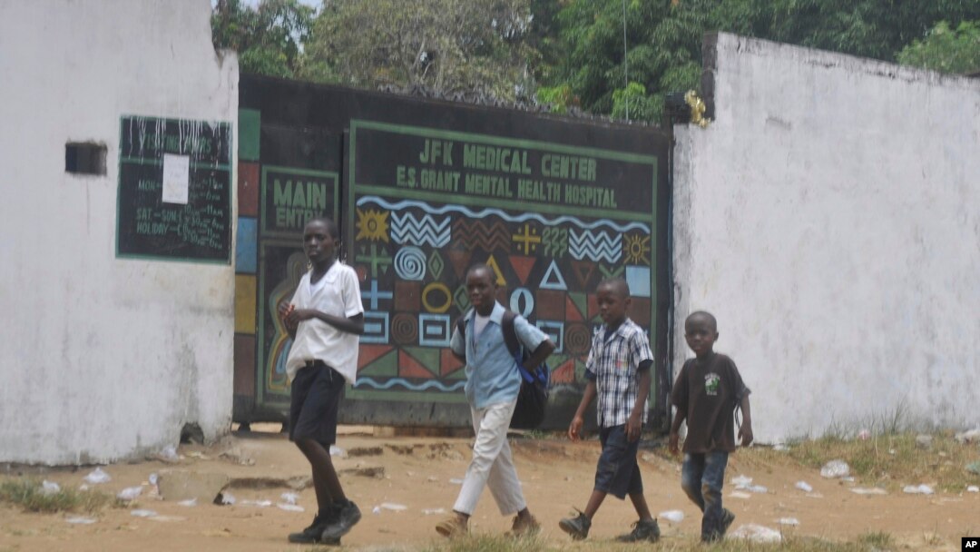 Children walk past JFK Medical centre in Monrovia, Liberia. Ebola centers. The trauma of the world’s deadliest Ebola outbreak, which killed more than 11,300, has left many survivors fighting a mental health battle to focus on the present, after witnessing drawn-out deaths and whole communities torn apart, March. 31, 2017.