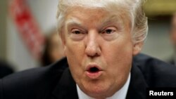 U.S. President Donald Trump speaks during a listening session with the Retail Industry Leaders Association and member company CEOs in the Roosevelt Room of the White House, Feb. 15, 2017. 
