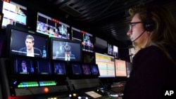 A journalist worka in a news room of the Dozhd (Rain) TV channel in Moscow, Russia, Aug. 20, 2021. (AP Photo)