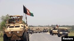 Pasukan Afghanistan bersiap untuk berperang melawan Taliban di pinggiran kota Kunduz, Afghanistan utara, 21 Juni 2015. 