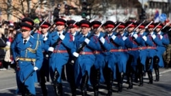 FILE - A Bosnian Serb honor guard marches through the center of Banja Luka, Jan. 9, 2020, during ceremony a marking the 28th anniversary of the founding of Republika Srpska, a Bosnian Serb political entity, within Bosnia and Herzegovina state.