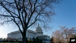 FILE - The US Capitol building is seen in Washington, March 21, 2022. 