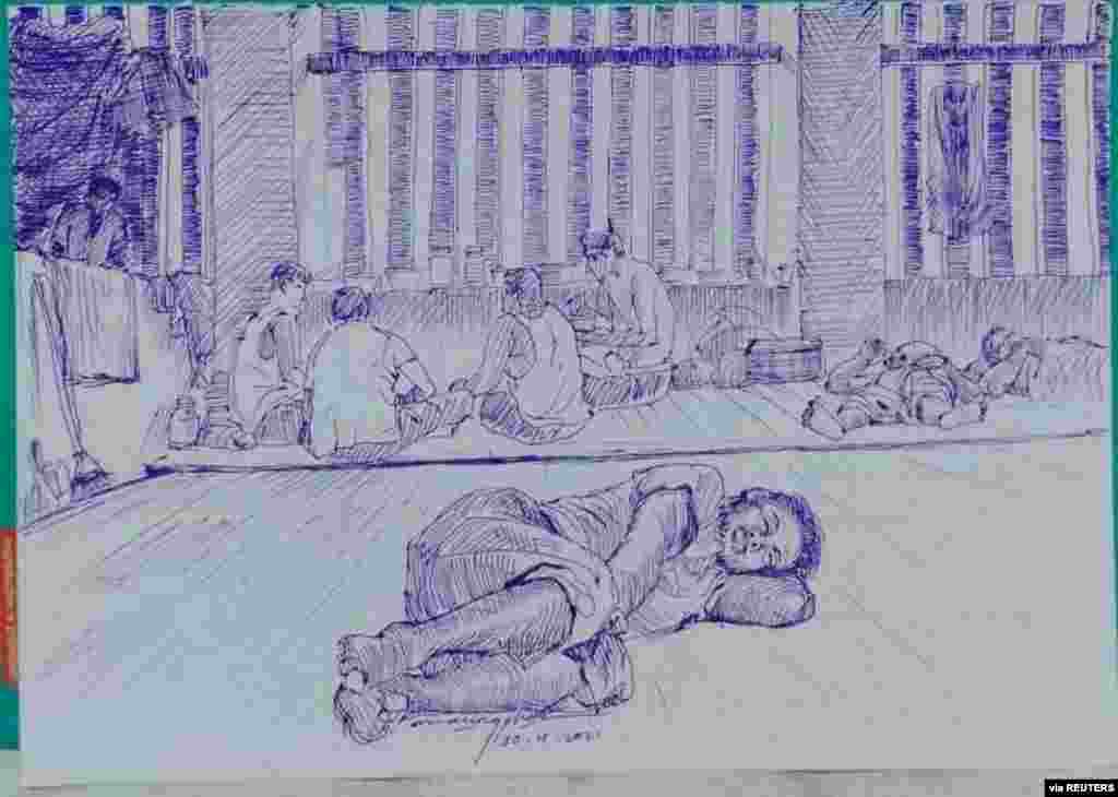 MYANMAR-POLITICS/PRISON -A smuggled sketch shows people inside of Myanmar's Insein prison with a written date April 17, 2021, in this undated picture obtained by REUTERS