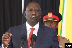FILE - Kenya's President William Ruto gestures as he speaks at the State House in Nairobi, Oct. 27, 2022.
