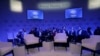 Para peserta menunggu dimulainya pertemuan tahunan World Economic Forum di Davos, Swiss, 22 Januari 2019.