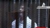 Morsi Trial Suspended in Cairo, Defense Walks Out of Court