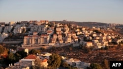 FILE - The Israeli settlement of Givat Zeev, near the Palestinian city of Ramallah in the occupied West Bank, is seen Sept. 25, 2019. 