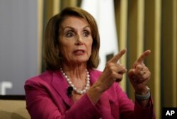 House Minority Leader Nancy Pelosi gestures while speaking at the Public Policy Institute of California, Aug. 22, 2018, in San Francisco.