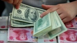 人民幣兌美元匯率跌至十四年來最低點 突破七心理大關