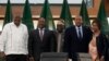 From left, Kenya's former president Uhuru Kenyatta, lead negotiator for Ethiopia's government, Redwan Hussein, African Union envoy Olusegun Obasanjo, lead Tigray negotiator Getachew Reda, and former South Africa's vice president Phumzile Mlambo-Ngcuka pos