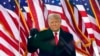 FILE - President Donald Trump gestures as he arrives to speak at a rally on Jan. 6, 2021, in Washington. 