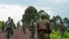 Para anggota kelompok pemberontak M23 menarik diri dari area di Kibumba, di dekat Kota Goma, provinsi Kivu Utara, Kongo, pada 23 Desember 2022. (Foto: Reuters/Arlette Bashizi)