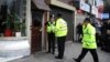 Police outside a property in Birmingham, England, March 23, 2017, following an attack on Wednesday in London.
