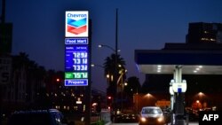 Gas prices of more than $7.00 per gallon are posted at a downtown Los Angeles gas station, March 9, 2022.