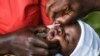 A baby receives a polio vaccine during the Malawi Polio Vaccination Campaign Launch, in Lilongwe Malawi, Sunday March 20, 2022. A drive to vaccinate more than 9 million children against polio has been launched this week in four countries in southern and e