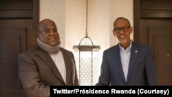 Presidente da RDC, Félix Tshisekedi (esq), e Presidente do Ruanda, Paul Kagame (dir), Aqaba, Jordania, 24 março 2022