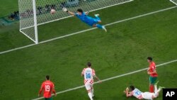 Croatia's Josko Gvardiol, second right, scores the opening goal during the World Cup third-place playoff soccer match between Croatia and Morocco at Khalifa International Stadium in Doha, Qatar, Dec. 17, 2022. 