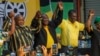 South African President Cyril Ramaphosa celebrates after being re-elected African National Congress president at the ANC national conference in Johannesburg, Dec. 19, 2022. 