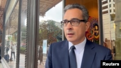 FILE - Dennis Miralis, the lawyer for former U.S. military pilot Daniel Duggan, speaking in Sydney, Australia, Nov. 4, 2022. Australia has approved a request to extradite Duggan to the U.S. where he faces charges of money laundering and breaking U.S. arms control laws.