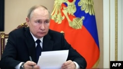 ARHIVA - Ruski predsjednik Vladimir Putin (Foto: Mikhail Kireyev / Sputnik / AFP)
