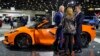 President Joe Biden talks with Mary Barra, CEO of General Motors, during a tour of the Detroit Auto Show, Sept. 14, 2022, in Detroit.