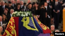 The coffin of Britain's Queen Elizabeth arrives at Westminster Hall from Buckingham Palace for her lying in state, in London, Sept. 14, 2022. 