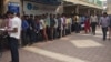 Millions Scramble to Swap Scrapped Indian Currency