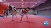 Afghan Taekwondo Competitor Says She Will 'Never' Fight Under Taliban Flag